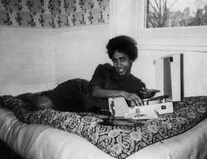 Rose in her bedroom listening to Bob Marley on her Dancette Record Player. Public Submission from our Grown Up In Britain campaign